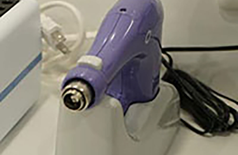 歯科麻酔用電動注射筒：オーラスター